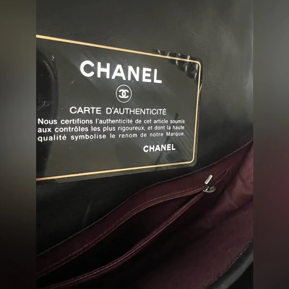 CHANEL Black Quilted & Fur Star-Studded Saddle Bag